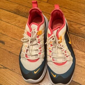 Nike Air Sneakers with Pink and Yellow Accents